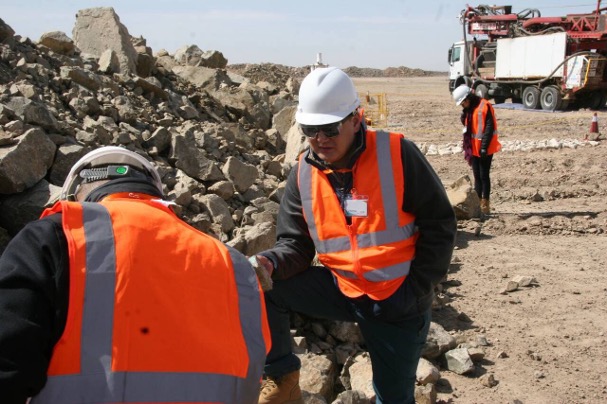 Workers inspecting site